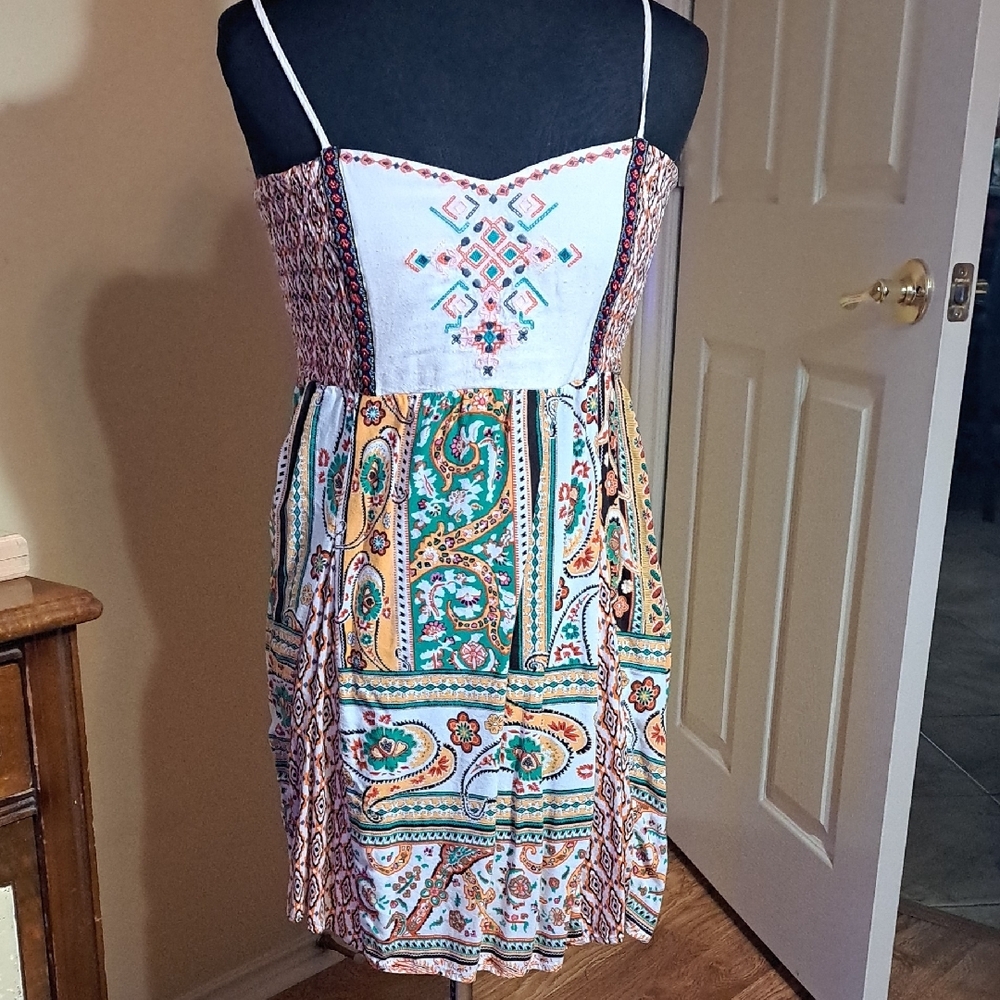 Vibrant Spaghetti Strap Dress with Intricate Patterns